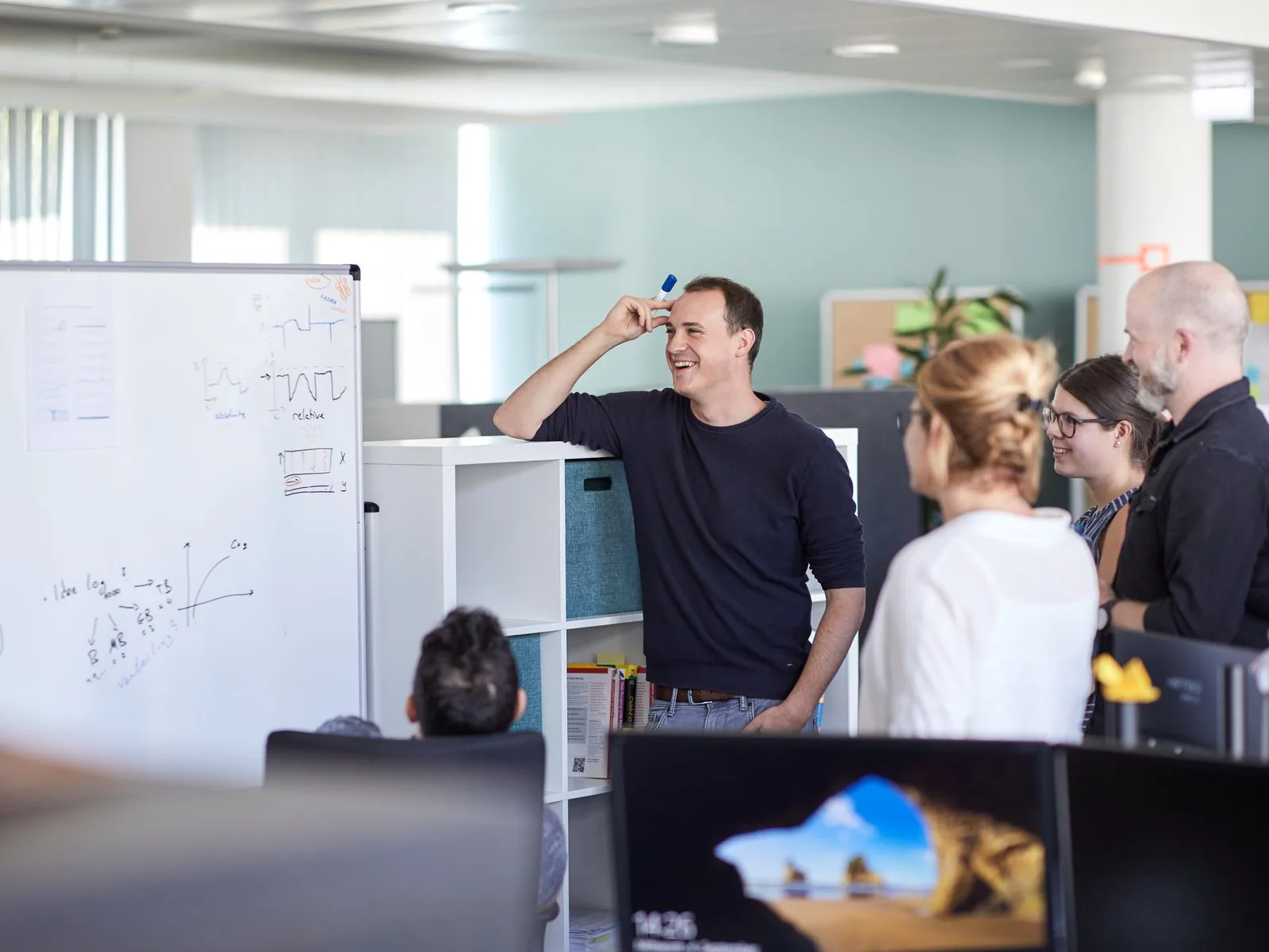 Adacor Cloud: Betriebsteam im Großraumbüro
